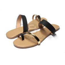 toe ring comfy flat sandals in soft black faux leather with metallic gold strap combination   front strap 