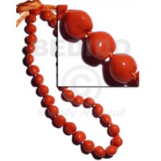 lei  kukui nut in red orange