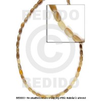 horn natural rice beads 4x7