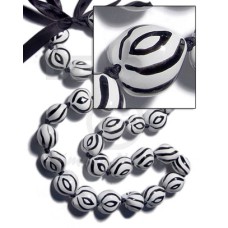 kukui seeds in animal print  zebra