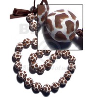 kukui seeds in animal print  giraffe