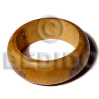robles rounded wood bangle with clear