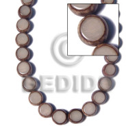 round buri seed with skin  sliced back to back