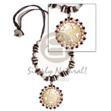 carved round floral mother of pearl shell (MOP) with brass wire