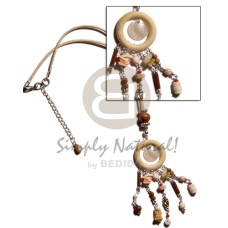 natural wood ring with dangling round hammershell,