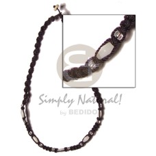 troca beads in black macrame