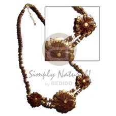 3 coco flowers with gold trimmings in