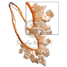 orange cleopatra macrame with dangling hammershell chips