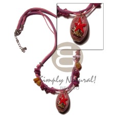 laminated cowrie shell pendant in wax