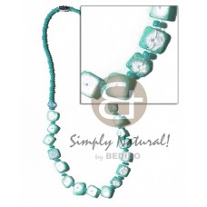 floating colored white rose in glass beads