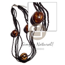 brown tiger kukui nuts in 5 rows