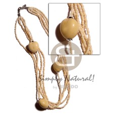 white kukui nuts in 5 rows multilayered