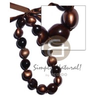 brown kukui nuts with alternate kukui