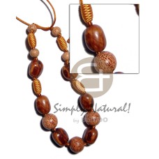 capsule wrapped wood beads with rubber seed,
