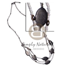 white glass beads with layered carabao oval