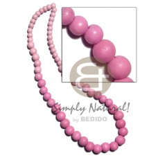 graduated natural wood beads in pink 