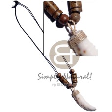 cowrie tiger tooth pendant with antique carabao