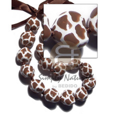 kukui seeds in animal print  giraffe