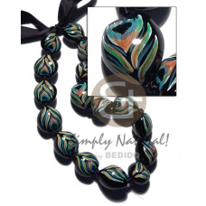 kukui seeds in animal print  peacock