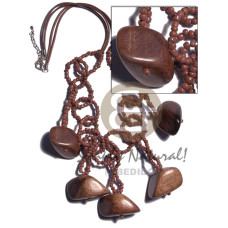 dangling camagong tiger hardwood chunks on brown glass bead ri