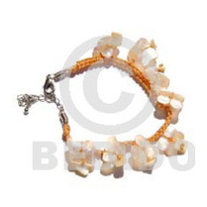 golden macramie with dangling hammershell