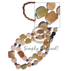 heishe natural wood beads with 2 graduated layers asstd. natural wood be