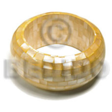 chunky bangle with orange hammershell blocking back