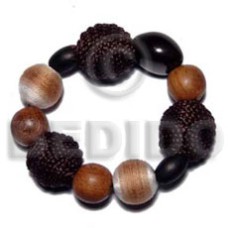 elastic bracelet with wrapped wood beads. bayong