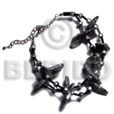 black coco nuggets in metallic silver splashing