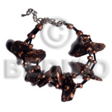 black coco nuggets in metallic bronze splashing