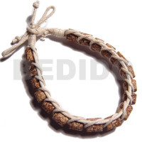 mahogany cylinder beads in macrame beige wax cord