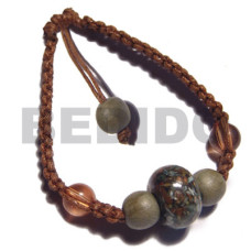brown wax cord macrame with crushed shells in resin ball and round