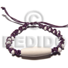 white mongo shell in violet wax cord macrame with wood beads accen
