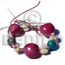 pink kukui nuts in red pink green wax cord with wood beads bonium 