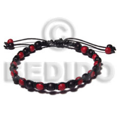round. natural wood beads in red and black in black wax cord macra