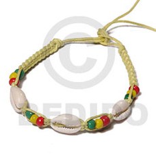 rasta braided pastel yellow macrame bracelet with 3 pcs. sigay cowrie shells  adjustable