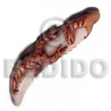 70mm cowrie tiger shell fang ( varying natural sizes ) with clay