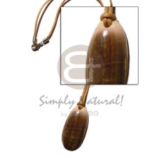 green shell pendant on wax cord